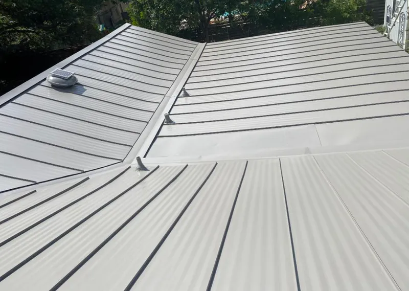 Solar attic fan installed on a metal roof for Roof Ventilation in Myrtle Beach